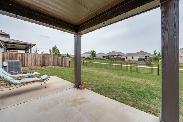1016 Webb Ave, Aubrey, TX 76227 - view of patio featuring a fenced backyard, central AC unit, and a residential view