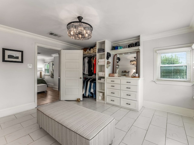 bedroom featuring crown molding, multiple windows, a closet, and visible vents