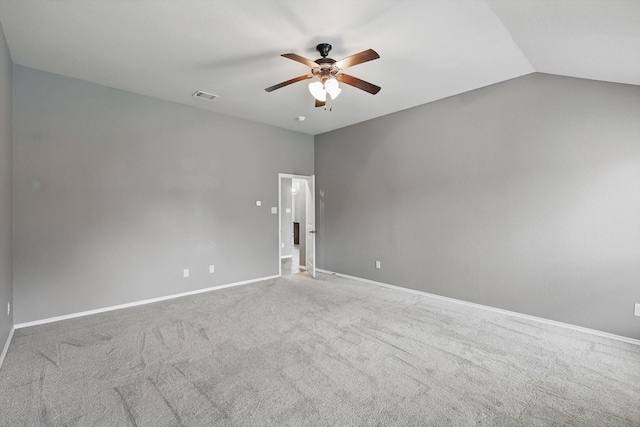spare room featuring visible vents, a ceiling fan, baseboards, and carpet flooring