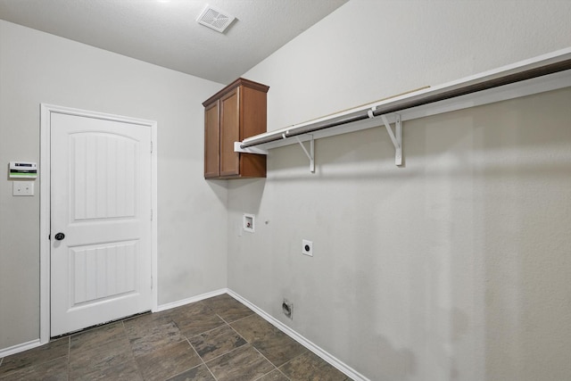 laundry room with cabinet space, hookup for a washing machine, baseboards, hookup for an electric dryer, and visible vents