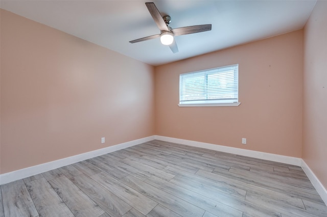 unfurnished room featuring baseboards, ceiling fan, and light wood finished floors