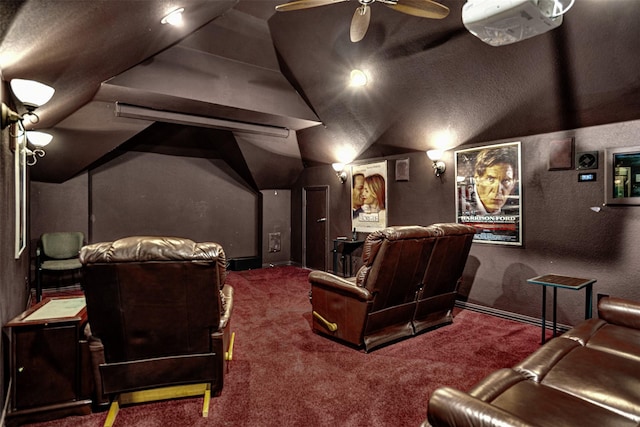 home theater with a ceiling fan, carpet, a textured ceiling, and vaulted ceiling