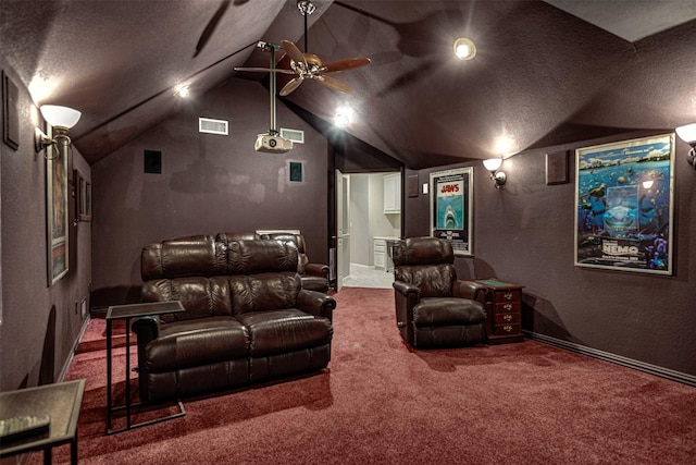 home theater room featuring ceiling fan, a textured ceiling, carpet, lofted ceiling, and visible vents