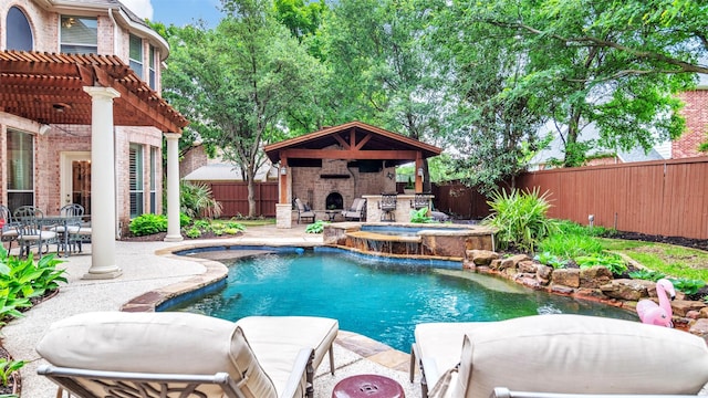 view of swimming pool with a patio, an outdoor fireplace, a fenced backyard, and a pergola