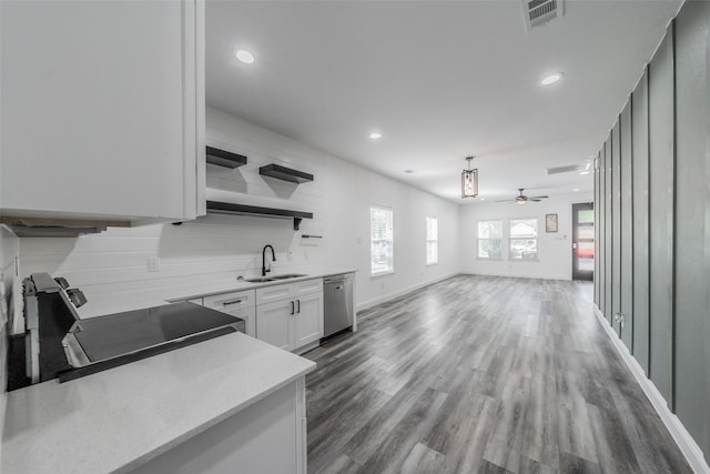 kitchen with a ceiling fan, visible vents, stainless steel dishwasher, open shelves, and a sink