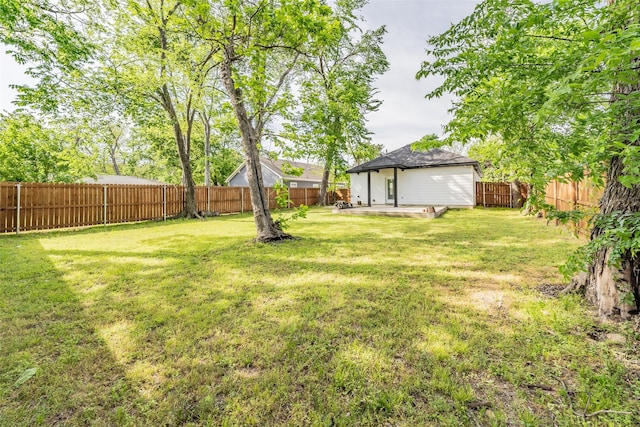 view of yard featuring a patio and a fenced backyard