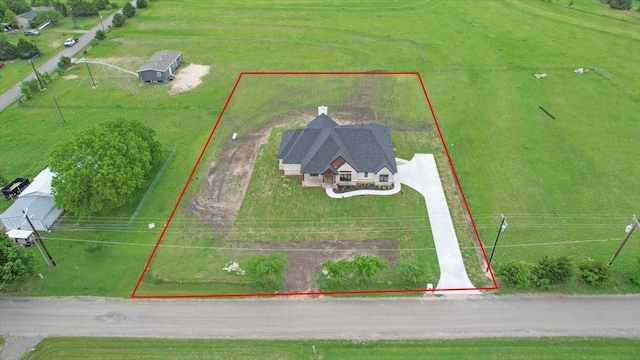 birds eye view of property featuring a rural view