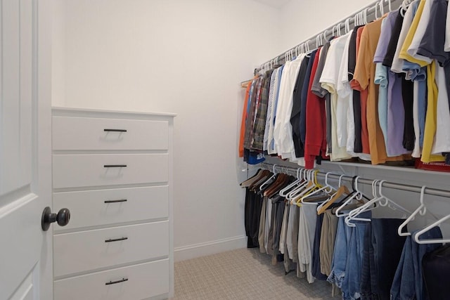 805 S Lindsay St, Gainesville, TX 76240 - spacious closet featuring carpet floors