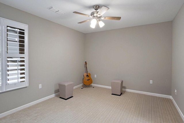 805 S Lindsay St, Gainesville, TX 76240 - carpeted spare room featuring a ceiling fan and baseboards