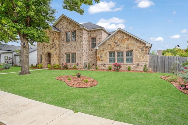 805 S Lindsay St, Gainesville, TX 76240 - view of front of house featuring brick siding and stone siding