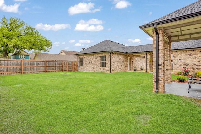 805 S Lindsay St, Gainesville, TX 76240 - view of yard with a patio area