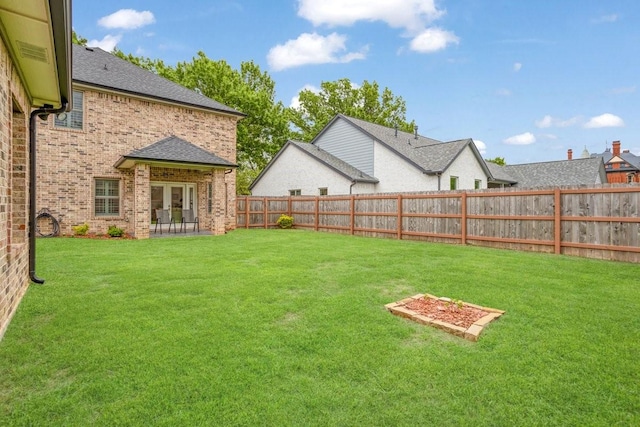 805 S Lindsay St, Gainesville, TX 76240 - view of yard with french doors