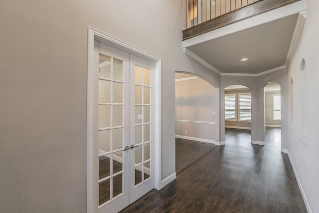 1310 Packsaddle Trl, Prosper, TX 75078 - hall featuring french doors, arched walkways, baseboards, and crown molding
