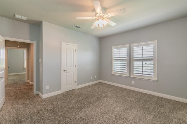 1310 Packsaddle Trl, Prosper, TX 75078 - unfurnished bedroom with baseboards, visible vents, ceiling fan, and carpet