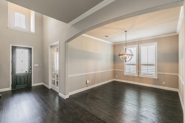 1310 Packsaddle Trl, Prosper, TX 75078 - entryway featuring arched walkways, baseboards, an inviting chandelier, ornamental molding, and dark wood-type flooring