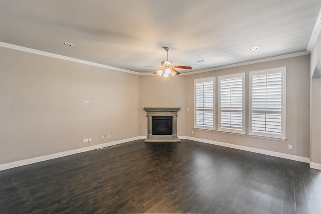 1310 Packsaddle Trl, Prosper, TX 75078 - unfurnished living room featuring a ceiling fan, crown molding, baseboards, a glass covered fireplace, and dark wood-type flooring