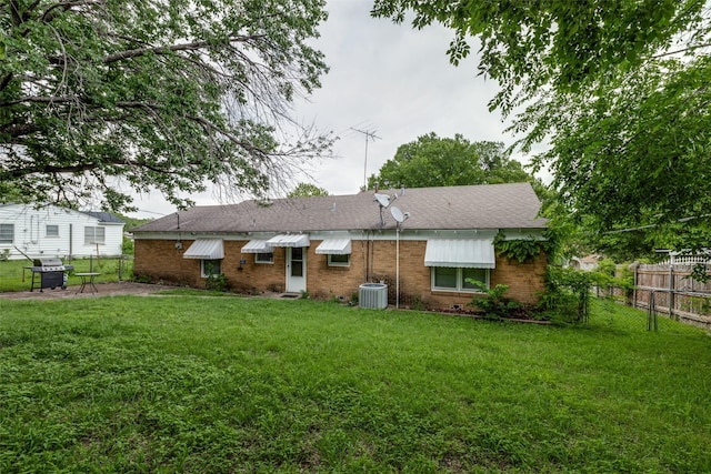 1813 Brook Hollow Dr, Fort Worth, TX 76114 - back of house with fence, a lawn, and brick siding