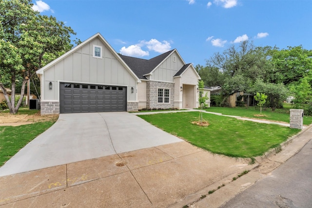 view of front of home with central AC, a front lawn, a garage, board and batten siding, and concrete driveway