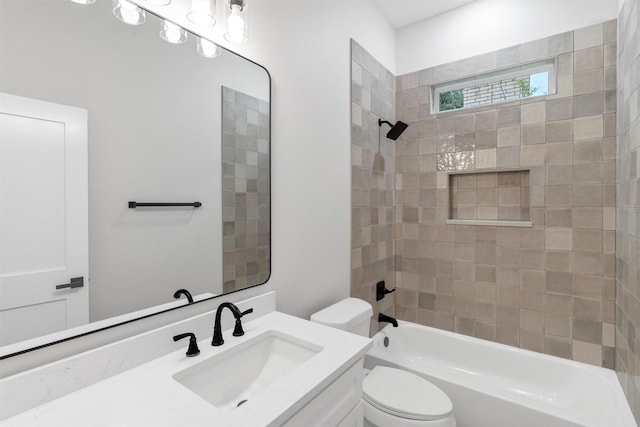 bathroom with shower / bath combination, vanity, and toilet