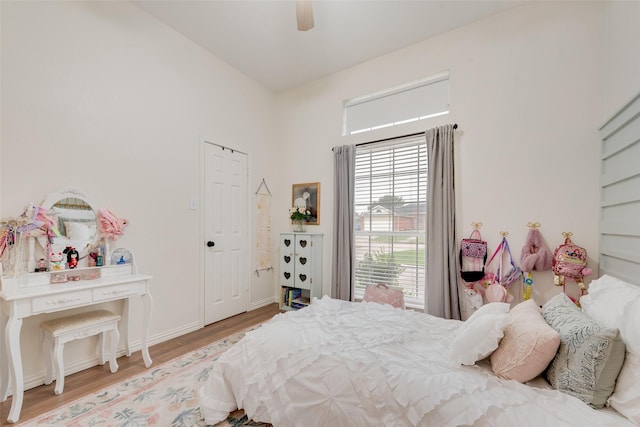 111 Princeton Cir, Forney, TX 75126 - bedroom featuring ceiling fan, baseboards, and light wood-type flooring
