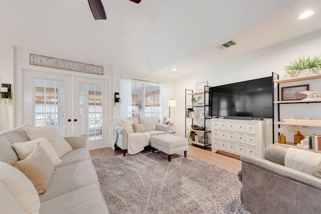 111 Princeton Cir, Forney, TX 75126 - living area featuring a healthy amount of sunlight, a ceiling fan, french doors, and light wood finished floors