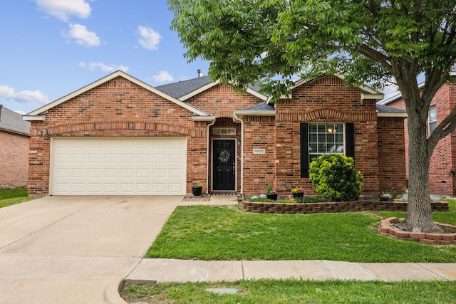 10602 Greenbriar Ln, Rowlett, TX 75089 - ranch-style house with a garage, a front lawn, roof with shingles, brick siding, and concrete driveway