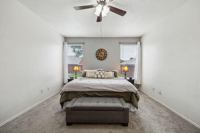 10602 Greenbriar Ln, Rowlett, TX 75089 - bedroom featuring multiple windows, carpet, and a ceiling fan