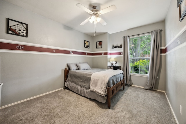 10602 Greenbriar Ln, Rowlett, TX 75089 - carpeted bedroom with baseboards and a ceiling fan