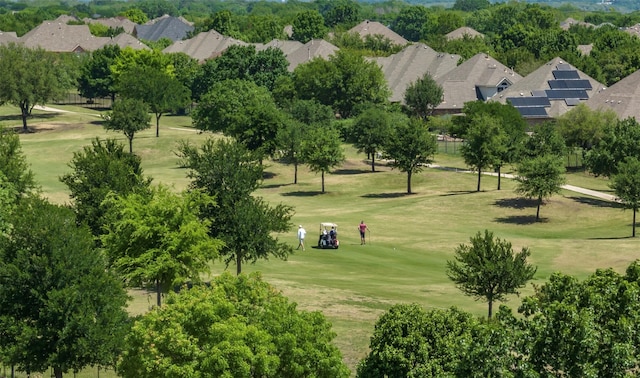 10602 Greenbriar Ln, Rowlett, TX 75089 - view of property's community with a yard and golf course view