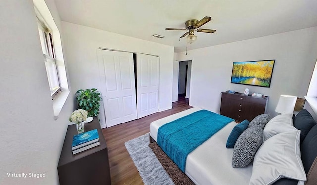 700 N Scarlett Dr, Lacy Lakeview, TX 76705 - bedroom with a closet, ceiling fan, wood finished floors, and visible vents