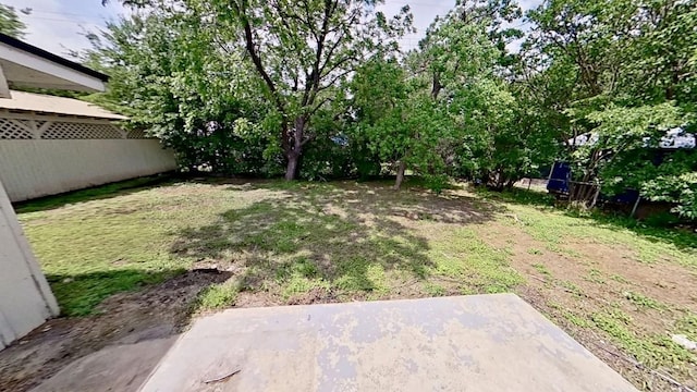 700 N Scarlett Dr, Lacy Lakeview, TX 76705 - view of yard featuring a patio and fence