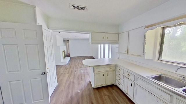 700 N Scarlett Dr, Lacy Lakeview, TX 76705 - bathroom with a shower stall, wood finished floors, vanity, baseboards, and toilet