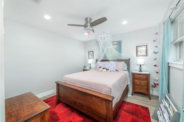 bedroom featuring recessed lighting, baseboards, ceiling fan, and wood finished floors
