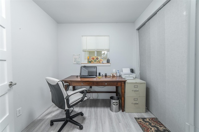 office space featuring light wood-style flooring
