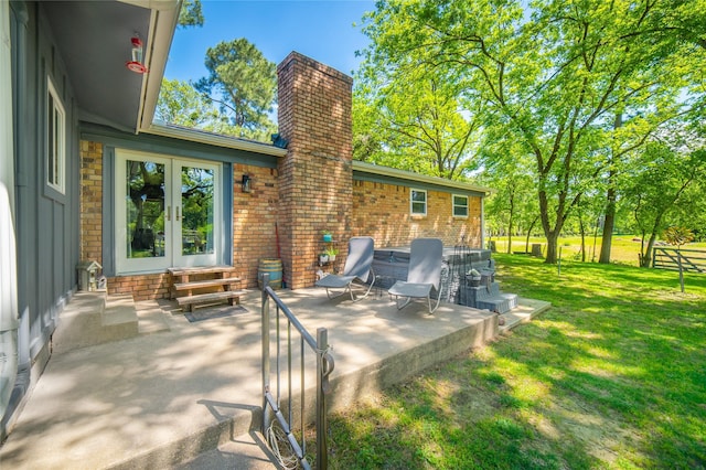 view of patio with french doors and entry steps