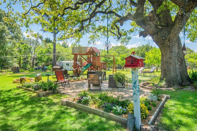 view of playground featuring a lawn
