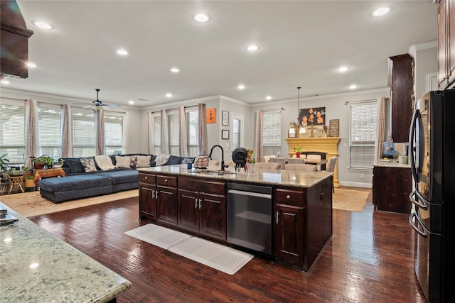 8225 Bonny Bank, The Colony, TX 75056 - kitchen with freestanding refrigerator, stainless steel dishwasher, crown molding, a sink, and open floor plan