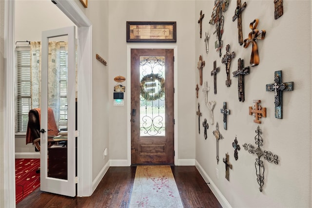8225 Bonny Bank, The Colony, TX 75056 - entryway featuring dark wood finished floors and baseboards