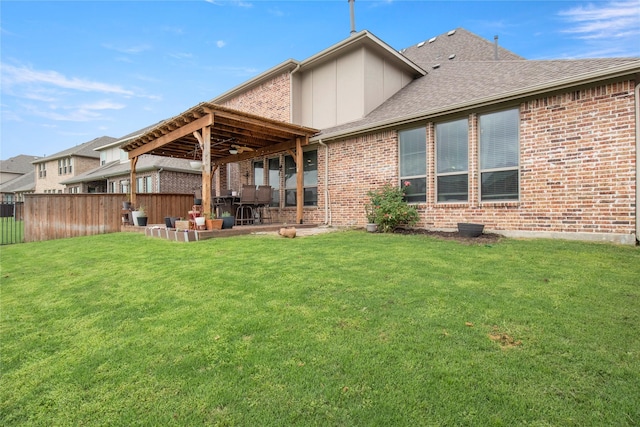 8225 Bonny Bank, The Colony, TX 75056 - back of house with a patio area, brick siding, board and batten siding, and a shingled roof