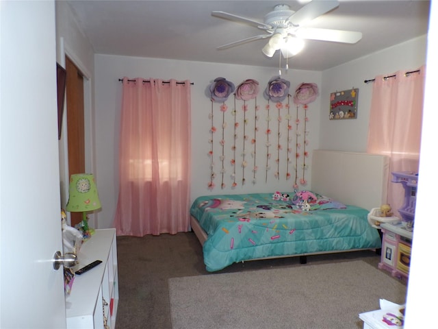 6905 Heritage Ln, Fort Worth, TX 76134 - carpeted bedroom featuring a ceiling fan
