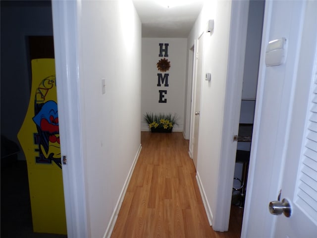 6905 Heritage Ln, Fort Worth, TX 76134 - hallway with baseboards and light wood-style flooring