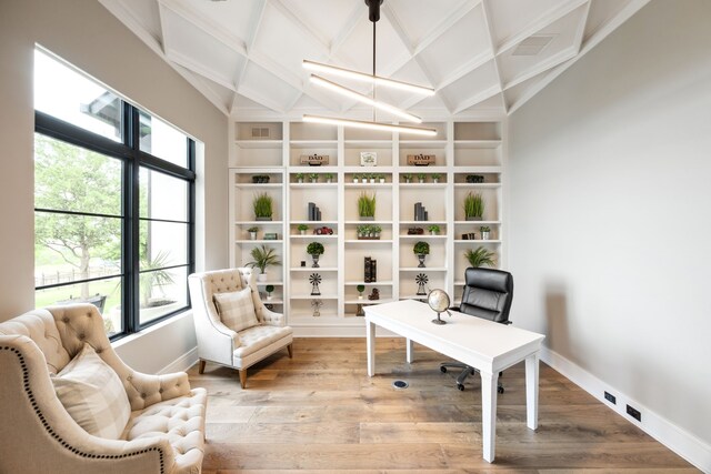 office area featuring beamed ceiling, baseboards, wood finished floors, and coffered ceiling
