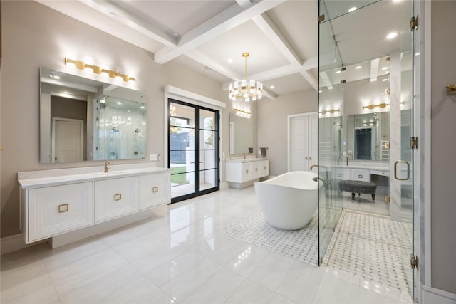 full bath with coffered ceiling, two vanities, a notable chandelier, and a shower stall
