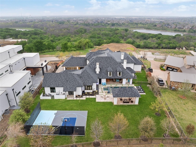 bird's eye view with a water view and a residential view