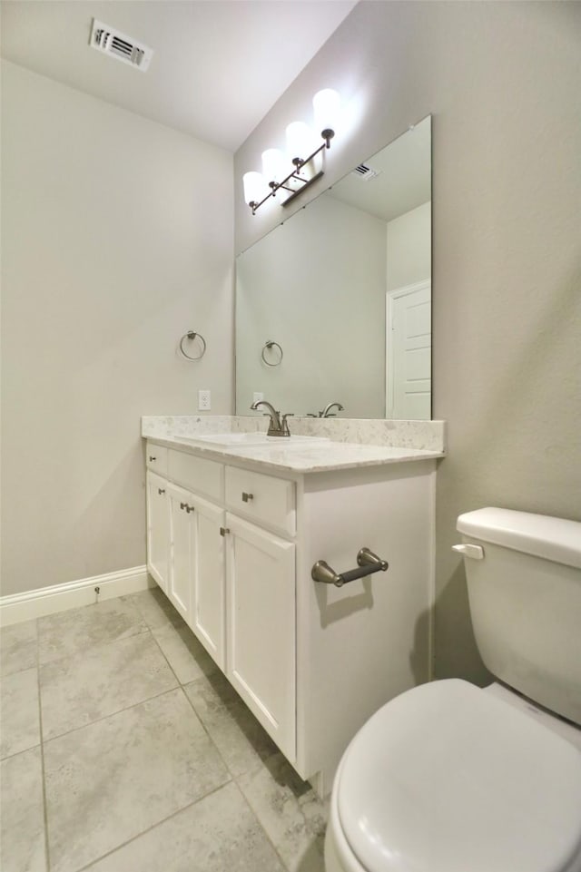 4713 Piedras Lanzar Dr, Mckinney, TX 75070 - bathroom featuring vanity, baseboards, toilet, and visible vents