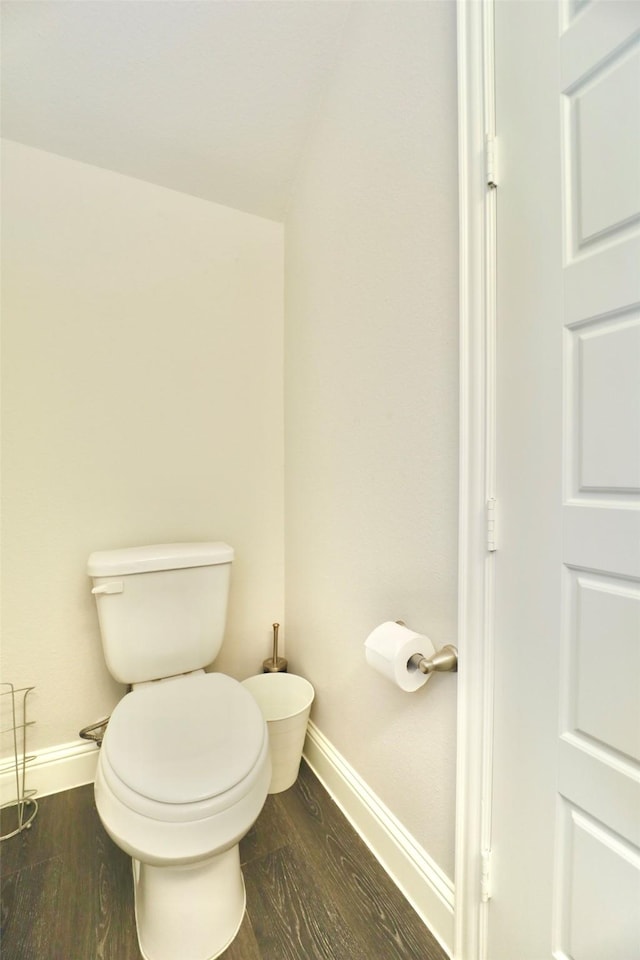 4713 Piedras Lanzar Dr, Mckinney, TX 75070 - bathroom with toilet, baseboards, and wood finished floors