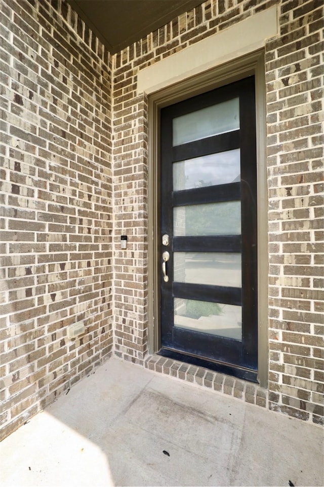 4713 Piedras Lanzar Dr, Mckinney, TX 75070 - property entrance featuring brick siding
