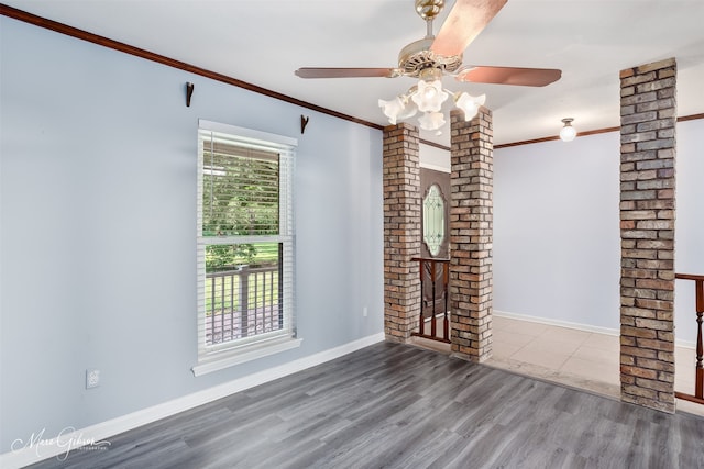 5220 Linton Cutoff Rd, Benton, LA 71006 - unfurnished living room with crown molding, a ceiling fan, baseboards, and wood finished floors
