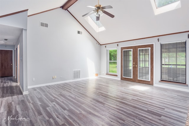 5220 Linton Cutoff Rd, Benton, LA 71006 - unfurnished living room with visible vents, a ceiling fan, and a skylight
