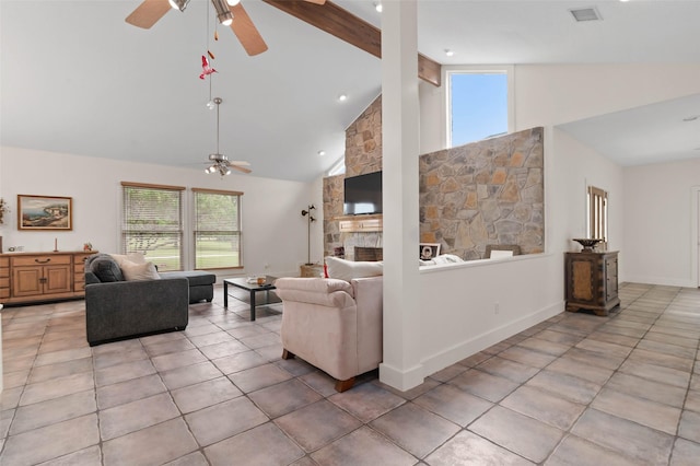living area featuring light tile patterned floors, high vaulted ceiling, ceiling fan, and visible vents